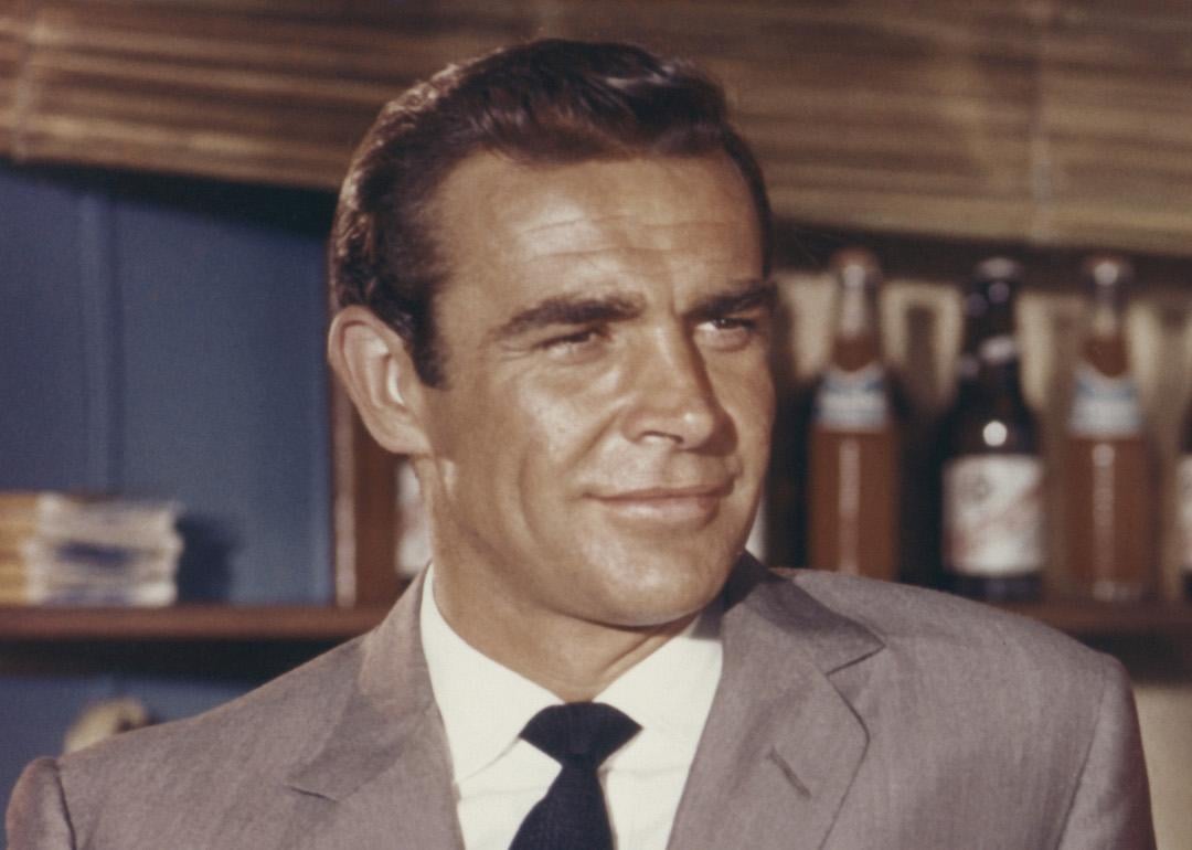 Actor Sean Connery in a gray suit and black tie as James Bond in the first film in the series in 1962.