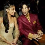 Singer Prince and his second wife, Manuela Testolini, sit in the audience at the 35th Annual NAACP Image Awards at the Universal Amphitheatre in March 2004 in Hollywood, California.