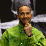 Lewis Hamilton poses during a talk at the IWC Schaffhausen booth at Watches and Wonders 2022 in Geneva, Switzerland, April 2022. 