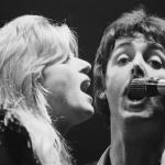 Linda and Paul McCartney perform with Wings in 1976.