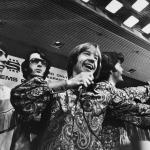 Davy Jones, Mike Nesmith, Peter Tork, and Micky Dolenz of The Monkees at a press conference in 1967.