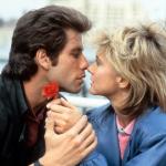 Actor John Travolta kisses actor Olivia Newton-John in a scene from the 1983 comedy 'Two of a Kind.'