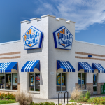 Popular fast food chain White Castle against a blue sky background