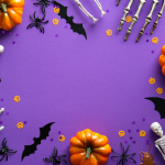 Halloween decorations against a purple backdrop
