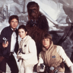 Actor Harrison Ford ,Carrie Fisher, Harrison Ford, Mark Hamill and Peter Mayhew as Chewbacca pose for a portrait on the set of Star Wars: The Empire Strikes Back in 1979 in London, England.