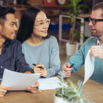 A couple discusses a home equity loan with loan officer