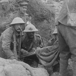 An archival photo of soldiers in trenches during World War 1 in a scene from "They Shall Not Grow Old"