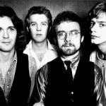 Members of the English rock band King Crimson pose for a portrait; from left to right: John Wetton, David Cross, Robert Fripp, and Bill Bruford.