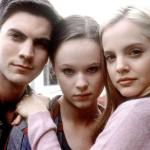 Actors Wes Bentley, Thora Birch, and Mena Suvari embrace in the 1999 movie 'American Beauty.'