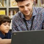 Nick Dinelaris, a Chapter One "early literacy interventionist," working with a student 