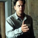 Actor Tim Robbins extends his hand in a scene from the 1994 film 'The Shawshank Redemption.'