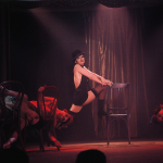 Liza Minelli performing on-stage in a scene from 'Cabaret' (1972)