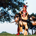 View of an unidentified Cherokee as he performs a traditional dance, Bartlesville, Oklahoma, June 5, 1988.