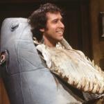 Comedian and actor Chevy Chase, dressed in his iconic 'landshark' costume, appears on an episode of 'Saturday Night Live' in New York in 1982.
