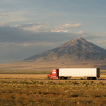 Delivery truck moving on Interstate 80 in Nevada, USA