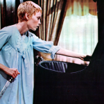 Mia Farrow clutches a knife in a scene from the film 'Rosemary's Baby', 1968. 
