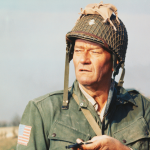 Actor John Wayne in military garb in a still from the film 'The Longest Day'