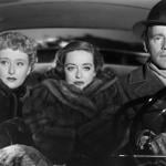 Actors Celeste Holm, Bette Davis, and Hugh Marlowe driving in the front seat of a car in the Best Picture winner 'All About Eve.'