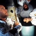 Actors Tom Hanks, Kevin Bacon, and Bill Paxton in zero gravity in a scene from the 1995 space film 'Apollo 13.'