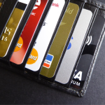 A close-up photograph of credit cards inside a wallet.