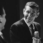 Johnny Carson, hosting NBC's 'Tonight' show, in December 1964.