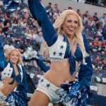 Dallas Cowboys Cheerleaders squad at a game in a scene from the upcoming Netflix docuseries 'America's Sweethearts: Dallas Cowboys Cheerleaders'