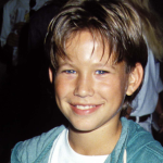 Young Jonathan Taylor Thomas at an event, circa 1990