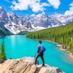 Admiring the Moraine Lake, the most famous and beautiful lake in Banff National Park in Alberta, Canada.