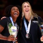 Simone Manuel and Gretchen Walsh react during the medal ceremony for the Women's 50m freestyle final at the 2024 U.S. Olympic Team Swimming Trials.
