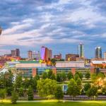 A downtown skyline view of Knoxville, Tennesse at twilight.