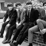 The Beatles (from left: John Lennon, George Harrison, Ringo Starr, and Paul McCartney) pose for pictures in London in September 1963.