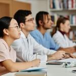 A group of medical students listening during a lecture.