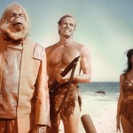 Actors Charlton Heston, Linda Harrison, and Maurice Evans in the 1968 sci-fi film 'Planet of the Apes.'