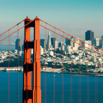 View of the Golden Gate Bridge with the San Francisco skyline in the background.