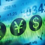 Financial markets and global economy concept illustrated by charts and superimposed symbols of United Kingdon Pound, European Euro, American Dollar and Japanese Yen.