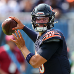 Caleb Williams of the Chicago Bears looks to pass during a game against the Tennessee Titans.