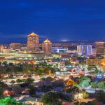 A view of Albuquerque, New Mexico's skyline in the evening.