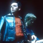 Darren Hayes and Daniel Jones of Savage Garden perform on stage.