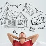 Creative illustration of a guy daydreaming about a house and car as an effect of lending rate cuts.