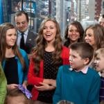 The Duggar family of '19 Kids and Counting' in New York's Times Square in 2014.