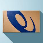 Sport shoe box with Asics logo printed on a blue background.