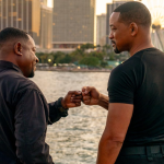 Martin Lawrence and Will Smith fist bumping in a scene from 'Bad Boys: Ride or Die'