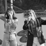 Singers Kiki Dee and Elton John perform at the Dr Pepper Music Festival at New York City's Central Park, 1977.