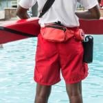 Lifeguard looking over pool.