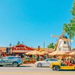 Cars driving through downtown Solvang, a city in Southern California's Santa Ynez Valley.