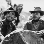  Actors Humphrey Bogart and Tim Holt pose for a publicity still for the Warner Bros/First National film 'The Treasure of the Sierra Madre' in 1948. 