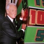 Game show host Bob Barker poses by one of the game props at CBS Studios to celebrate his 30th anniversary as host of 'The Price Is Right.'