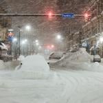 Vehicles are seen abandoned in heavy snowfall in downtown Buffalo, New York, on Dec. 26, 2022.