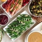 An table of assorted holiday side dishes and recipes.