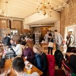 A busy restaurant during daytime.